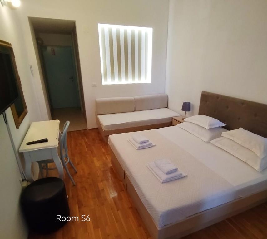 Postel nebo postele na pokoji v ubytování Riva Brela