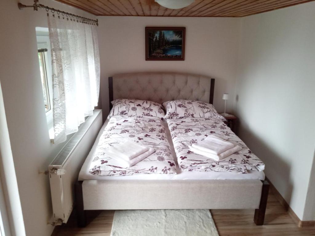 Postel nebo postele na pokoji v ubytování Apartmán Jarka