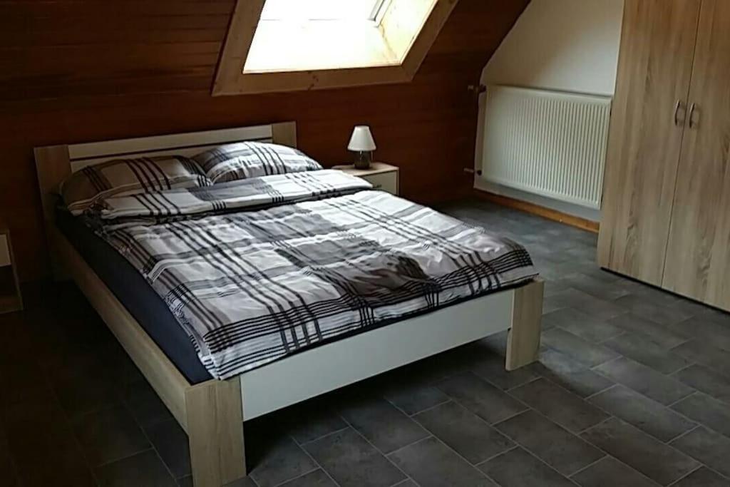 Postel nebo postele na pokoji v ubytování Tati's Ferienwohnung