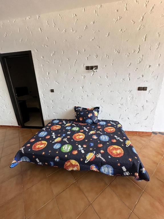 Postel nebo postele na pokoji v ubytování Belyounech vue sur mer et montagne 2 bederoom