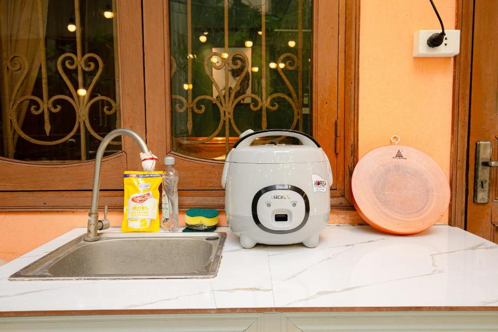 Fotografija u galeriji objekta Sisan Homestay 294 Kim Mã Ban công thư giãn u Hanoju