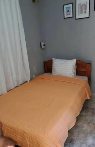 Giường trong phòng chung tại Saturn Central Lux Studio