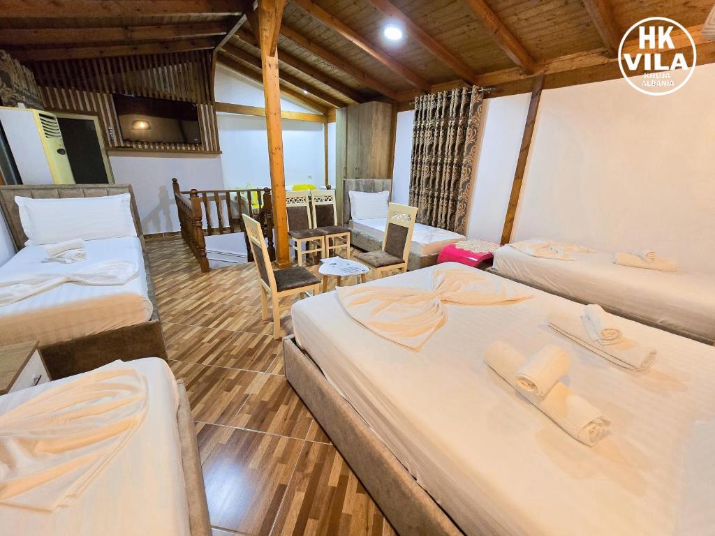 Postel nebo postele na pokoji v ubytování Vila HK