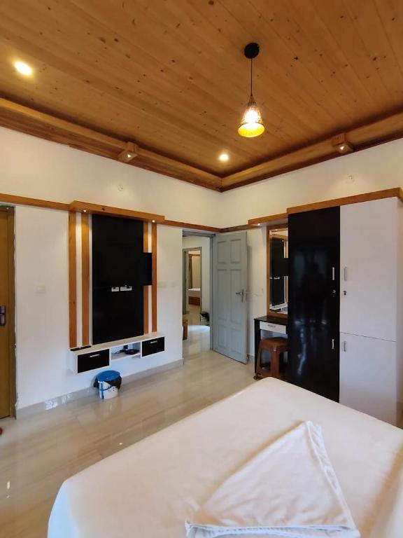 Postel nebo postele na pokoji v ubytování Coffee Green cottage