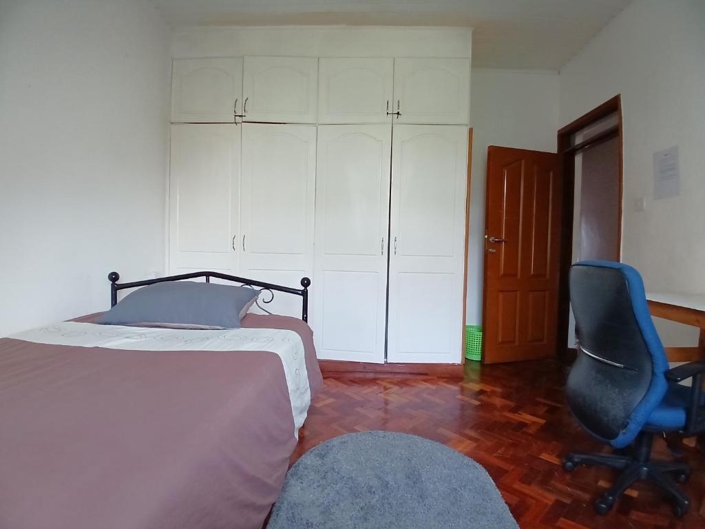 Postel nebo postele na pokoji v ubytování Budget Room Lavington