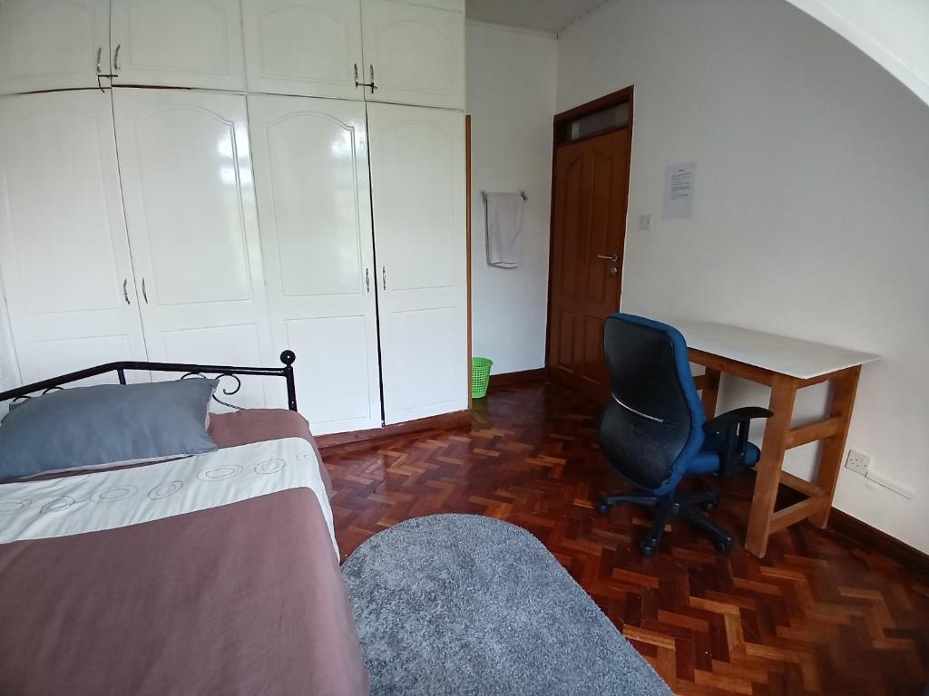 Postel nebo postele na pokoji v ubytování Budget Room Lavington