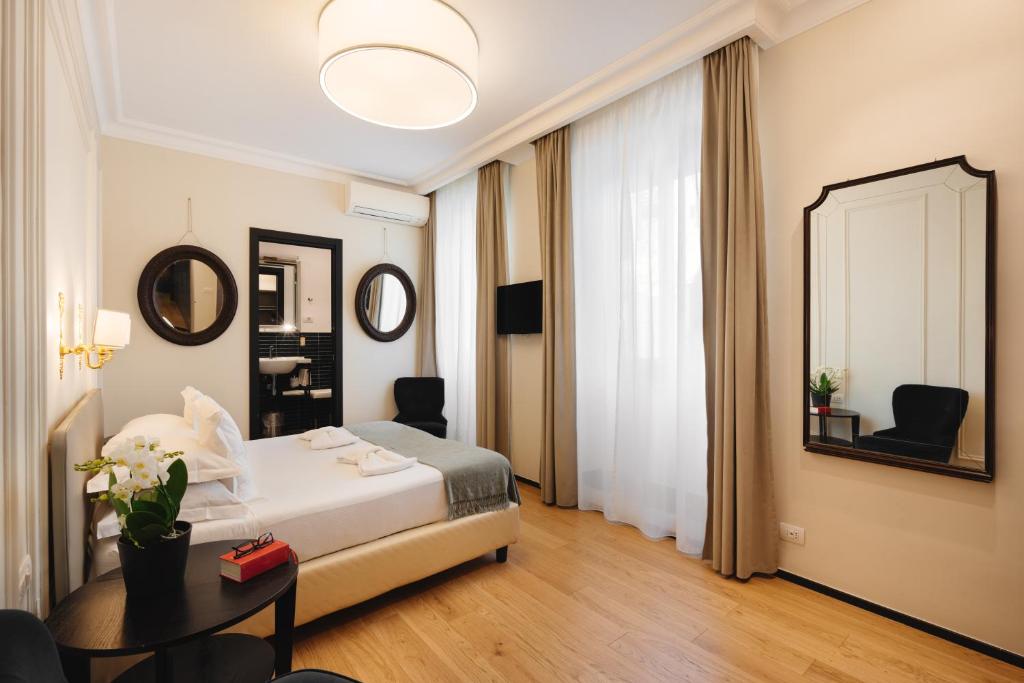 Postel nebo postele na pokoji v ubytování Deseo Home