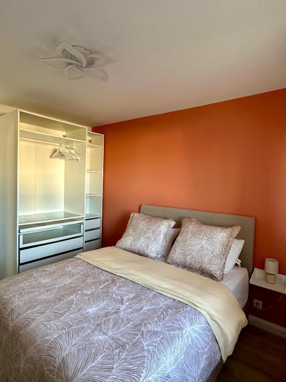 Postel nebo postele na pokoji v ubytování Flori'Home