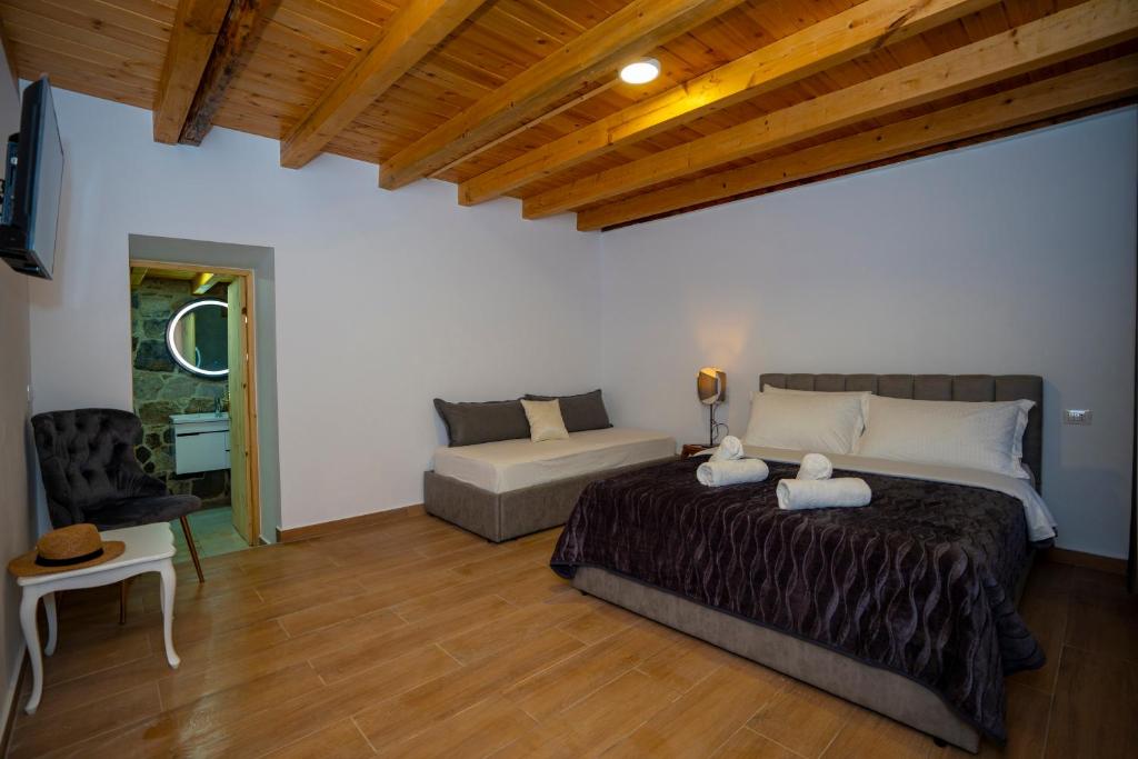 Postel nebo postele na pokoji v ubytování villa prelatheth