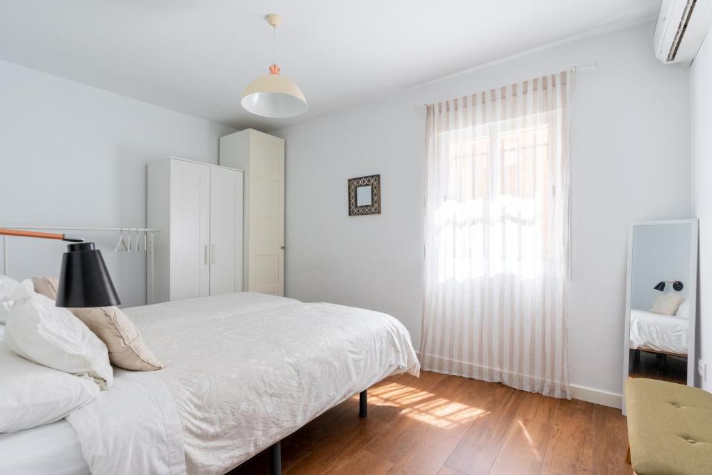 A bed or beds in a room at Azahar
