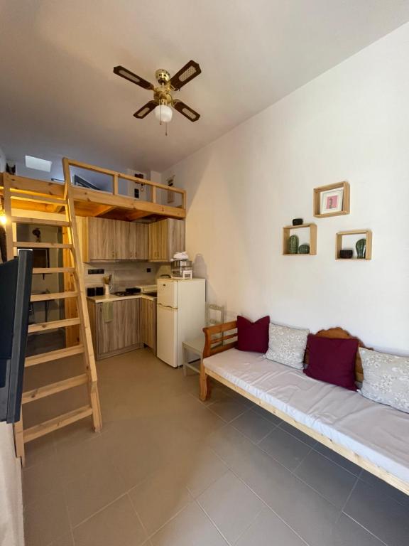 Postel nebo postele na pokoji v ubytování Xerolithia