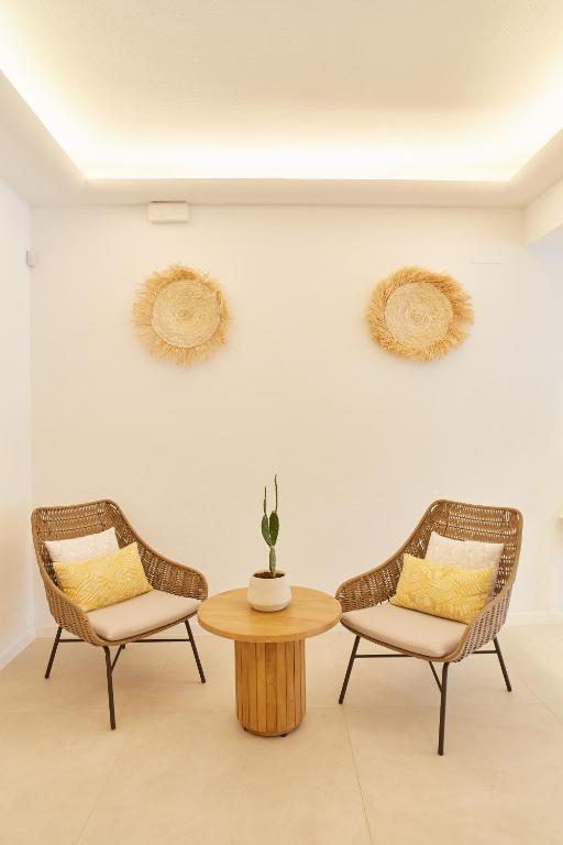 A seating area at Excelsior Estudios & Apartamentos