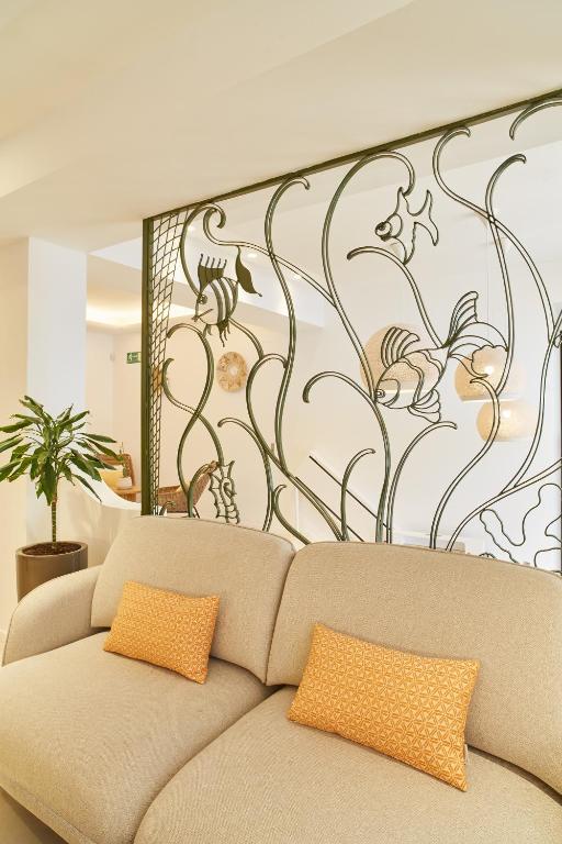A seating area at Excelsior Estudios & Apartamentos