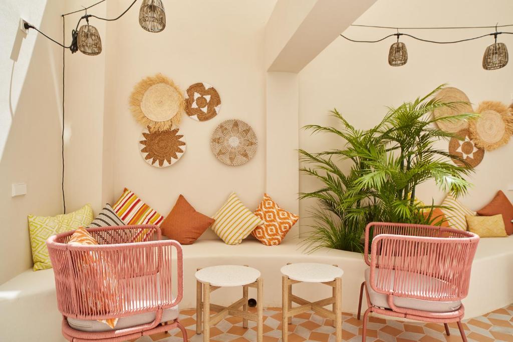 A seating area at Excelsior Estudios & Apartamentos