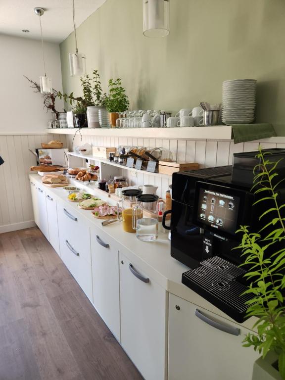 Kuchyň nebo kuchyňský kout v ubytování Casa Beniamino