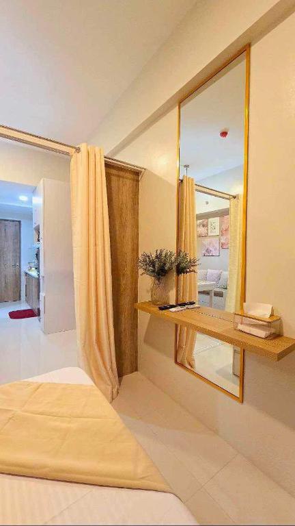 Postel nebo postele na pokoji v ubytování JeeCee Homes in Mactan Lapu-Lapu Cebu