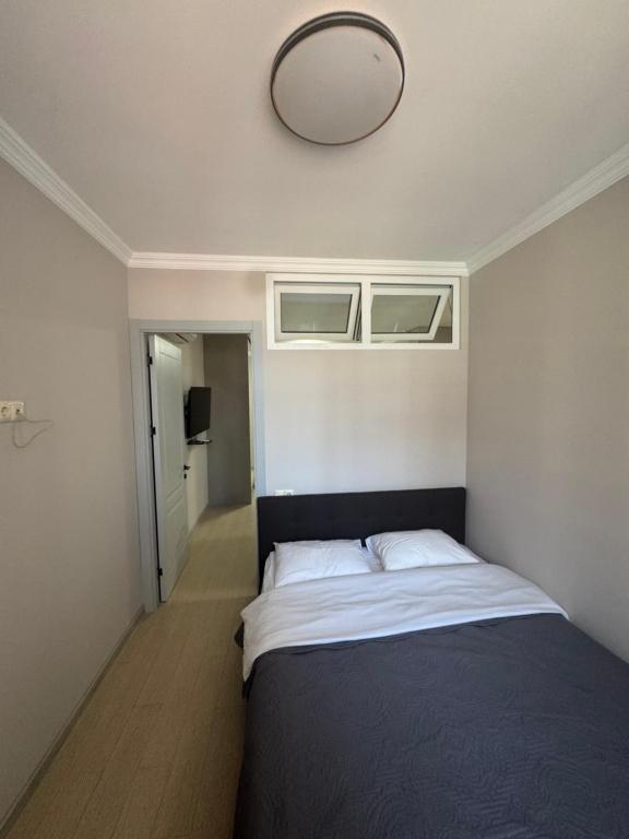 Postel nebo postele na pokoji v ubytování Pirosmani Mini Hotel