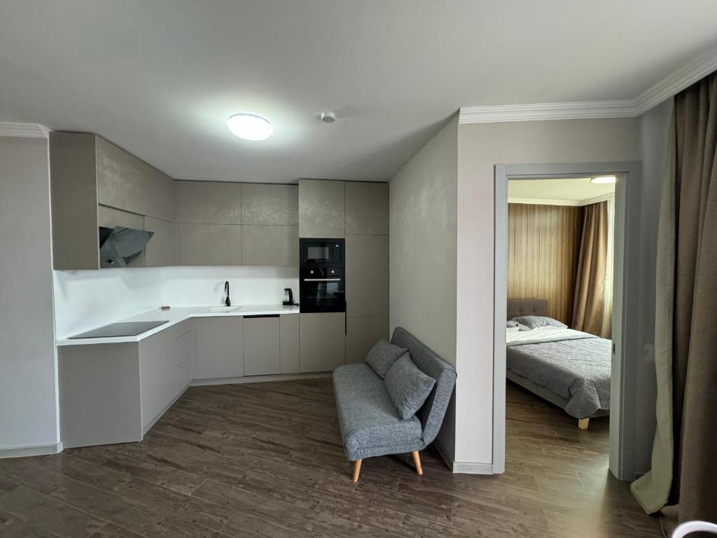 Postel nebo postele na pokoji v ubytování Pirosmani Mini Hotel