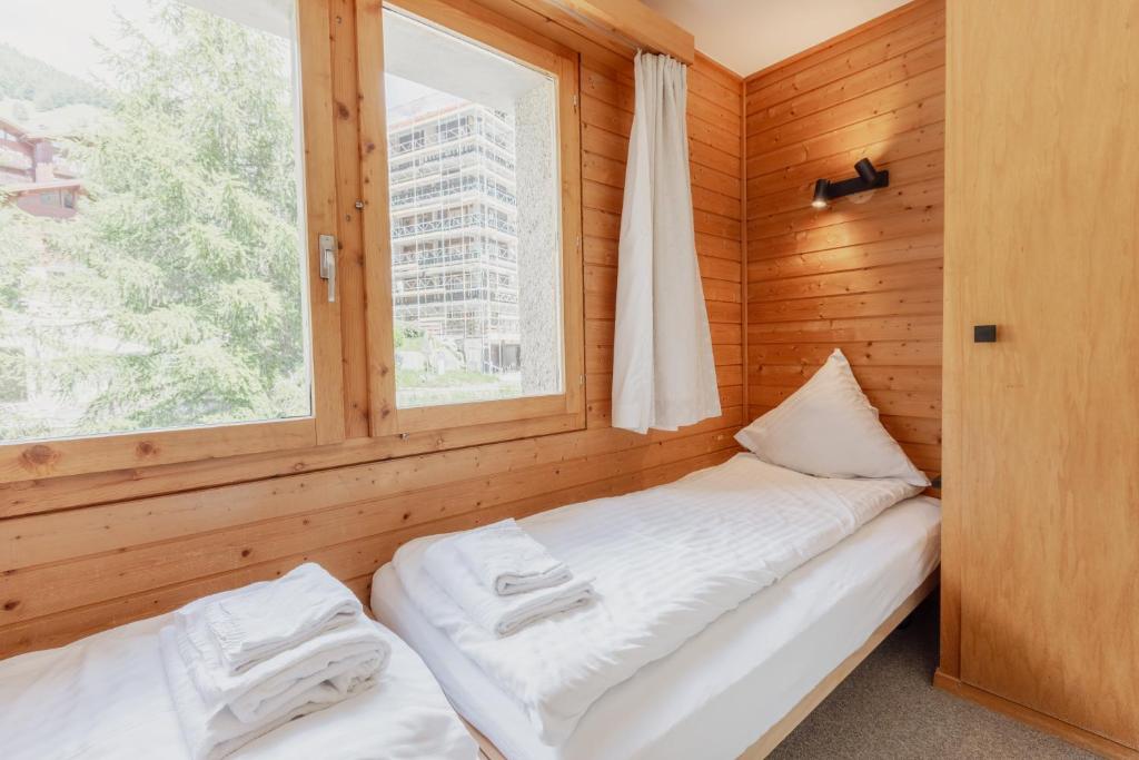 Postel nebo postele na pokoji v ubytování Charmant duplex à 3min des remontées mécaniques