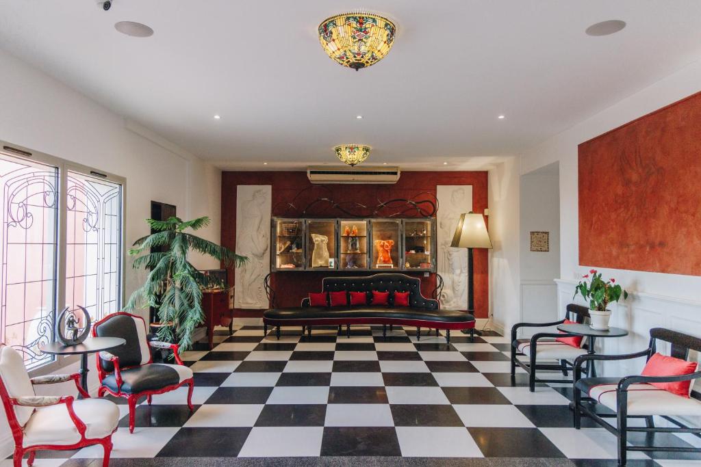 Posezení v ubytování Hôtel Liberata & Spa