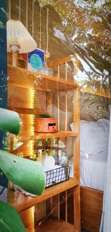 Palanda nebo palandy na pokoji v ubytování Natural Home Đà Lạt