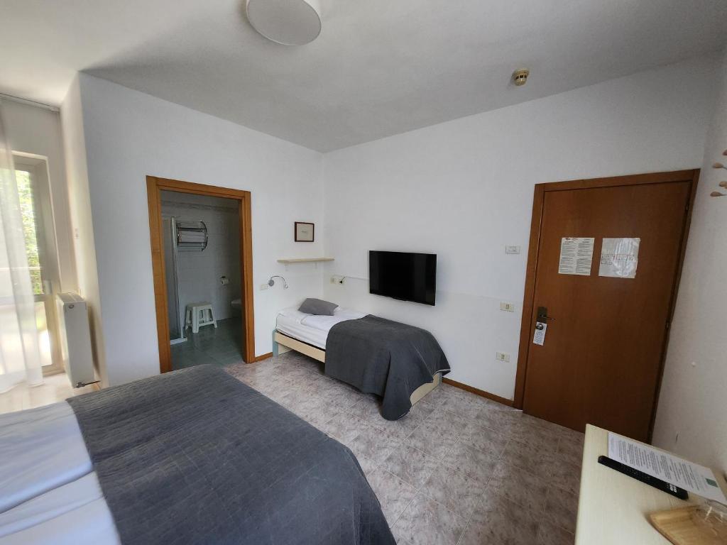 TV a/nebo společenská místnost v ubytování Casa Beniamino