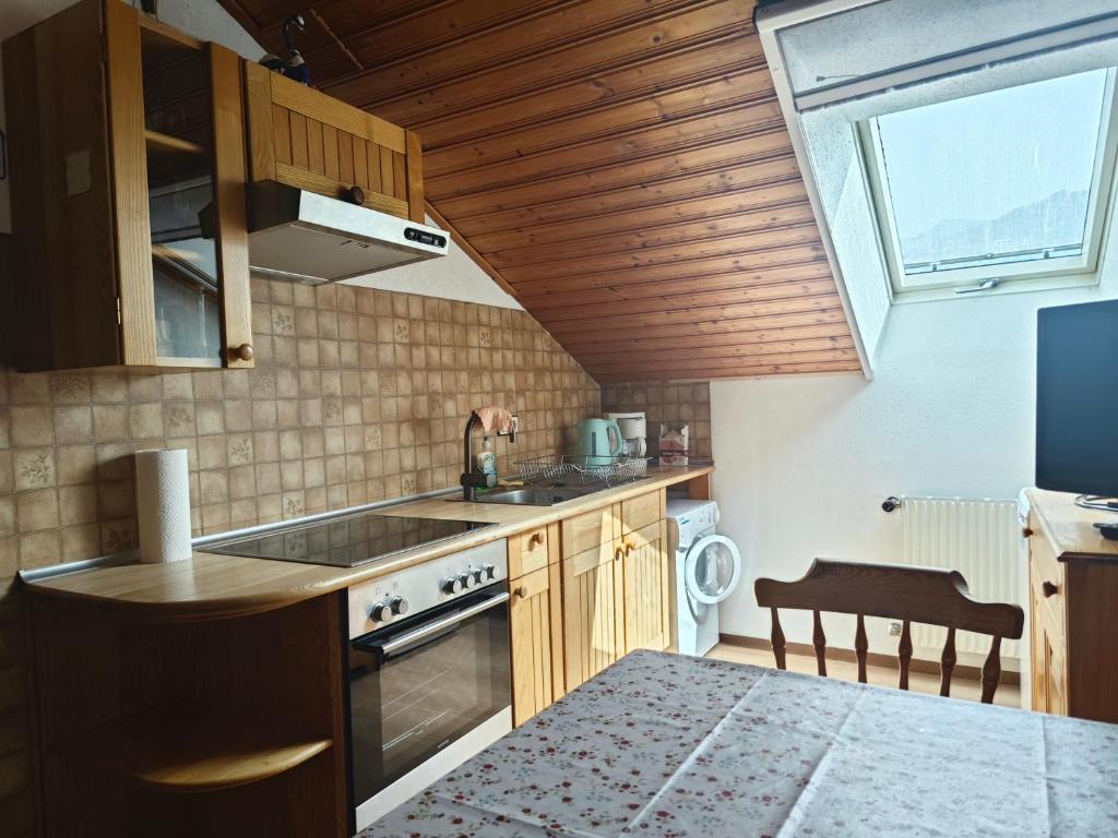Kuchyň nebo kuchyňský kout v ubytování Christis Apartments