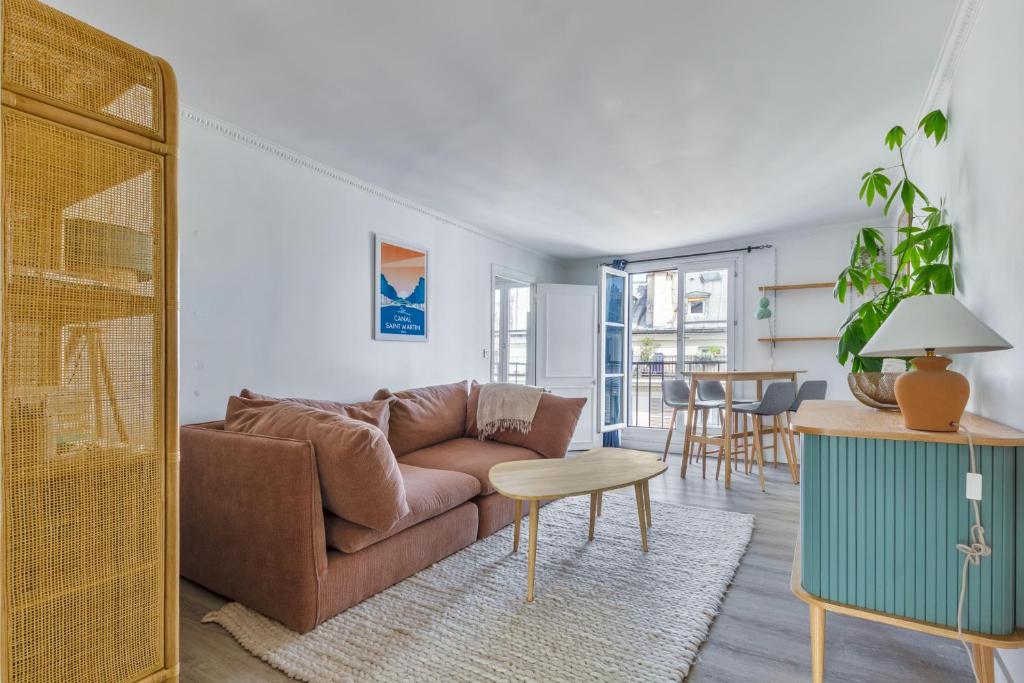 Photo de la galerie de l'établissement Faubourg St Martin - Canal Saint Martin Chaleureux appartement, à Paris