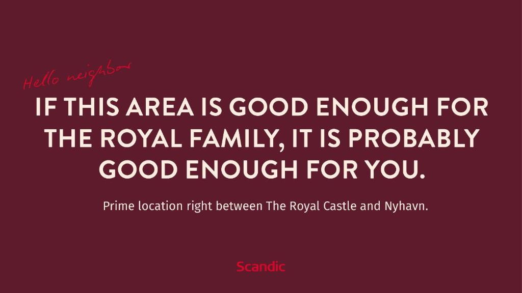 a red sign with the words if this area is good enough for the royal family at Scandic Front in Copenhagen