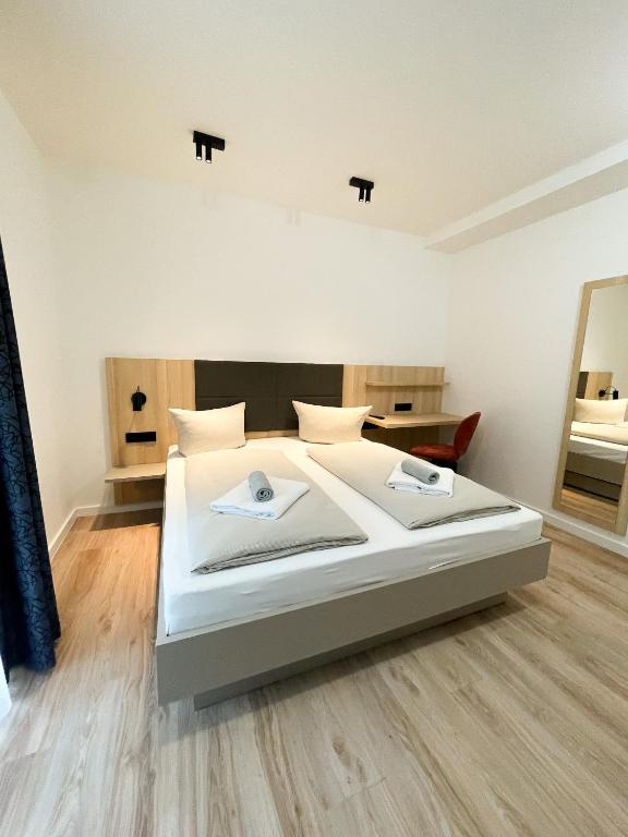 Postel nebo postele na pokoji v ubytování HOLI City Apart Hotel Berlin