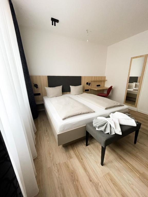 Postel nebo postele na pokoji v ubytování HOLI City Apart Hotel Berlin