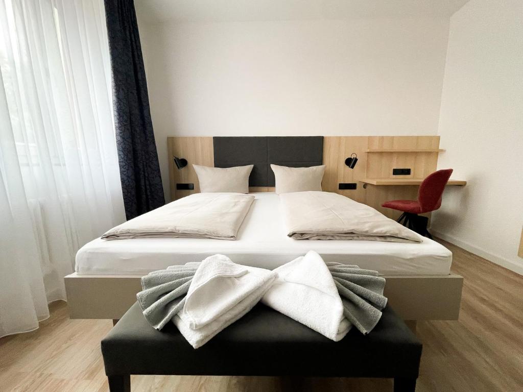 Postel nebo postele na pokoji v ubytování HOLI City Apart Hotel Berlin