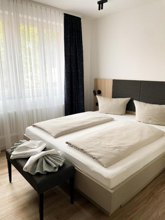 Postel nebo postele na pokoji v ubytování HOLI City Apart Hotel Berlin