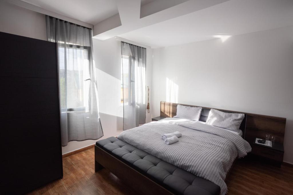 Postel nebo postele na pokoji v ubytování Garni Hotel Palma