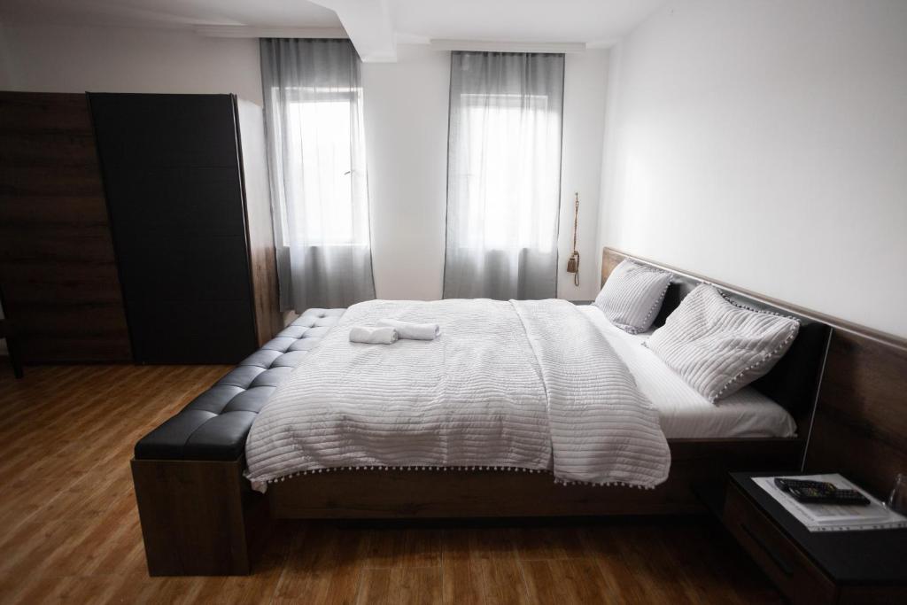 Postel nebo postele na pokoji v ubytování Garni Hotel Palma