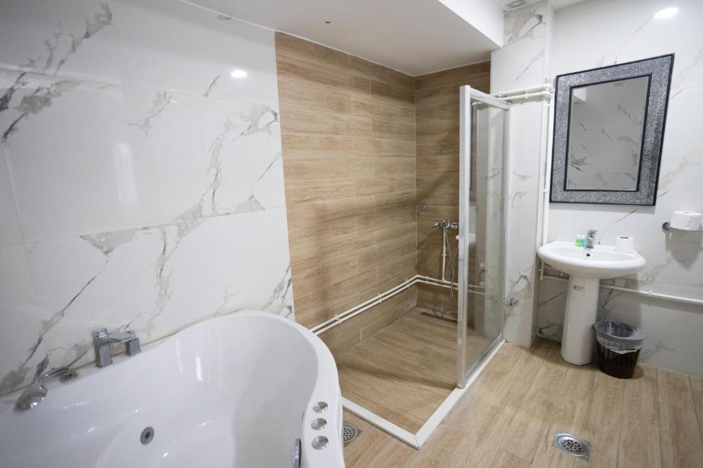 Koupelna v ubytování Garni Hotel Palma