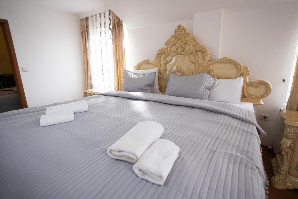 Postel nebo postele na pokoji v ubytování Garni Hotel Palma