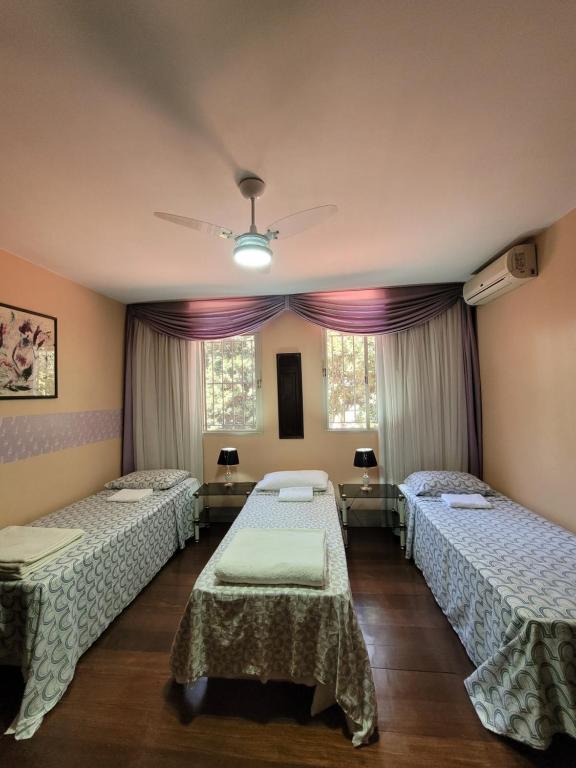 Postel nebo postele na pokoji v ubytování Kzazendf Cama&Cafe Hospedagem Familiar