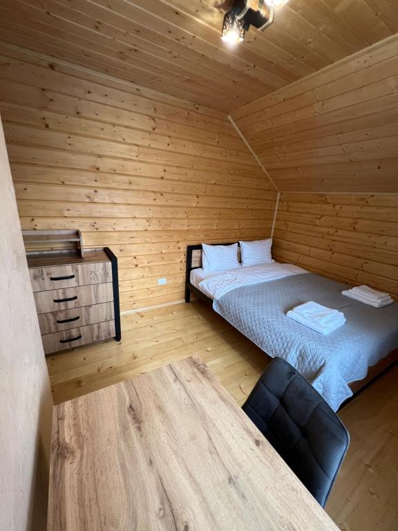 Postel nebo postele na pokoji v ubytování Kolos house