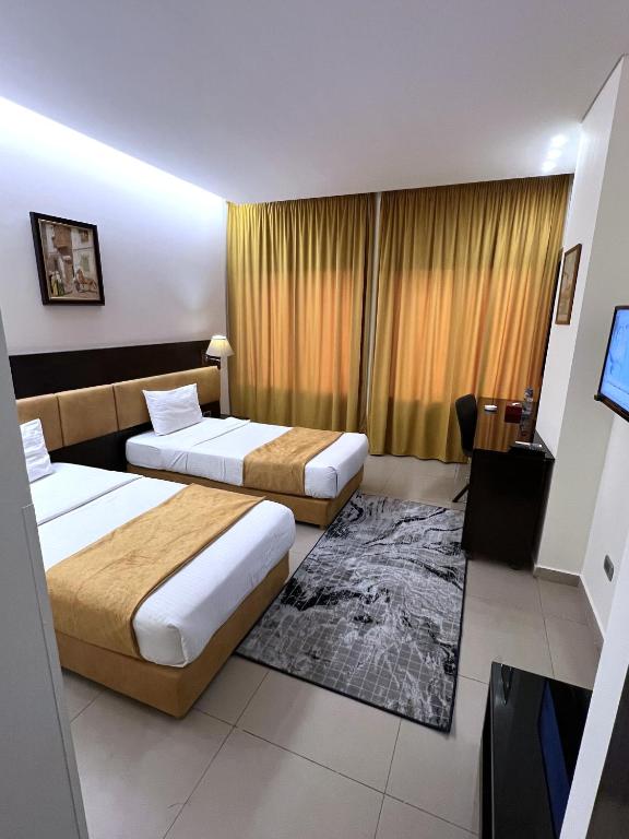 Postel nebo postele na pokoji v ubytování Duroy Hotel By Beverly