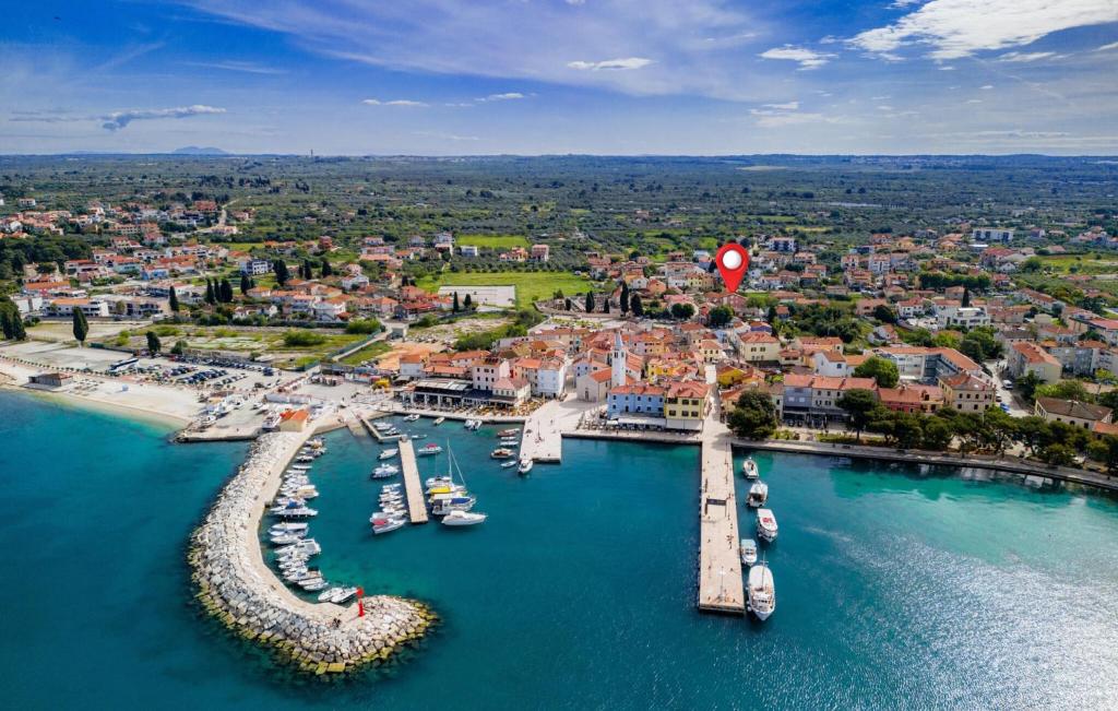 an aerial view of a harbor with boats in the water at Beautiful Apartment In Fazana With Wifi in Fažana