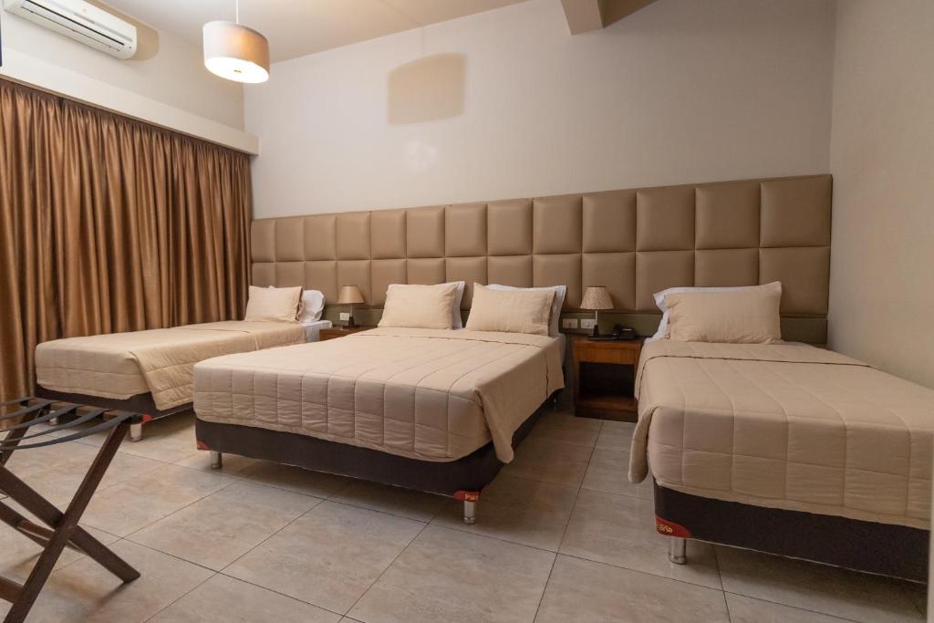 Postel nebo postele na pokoji v ubytování Hotel Hohenau