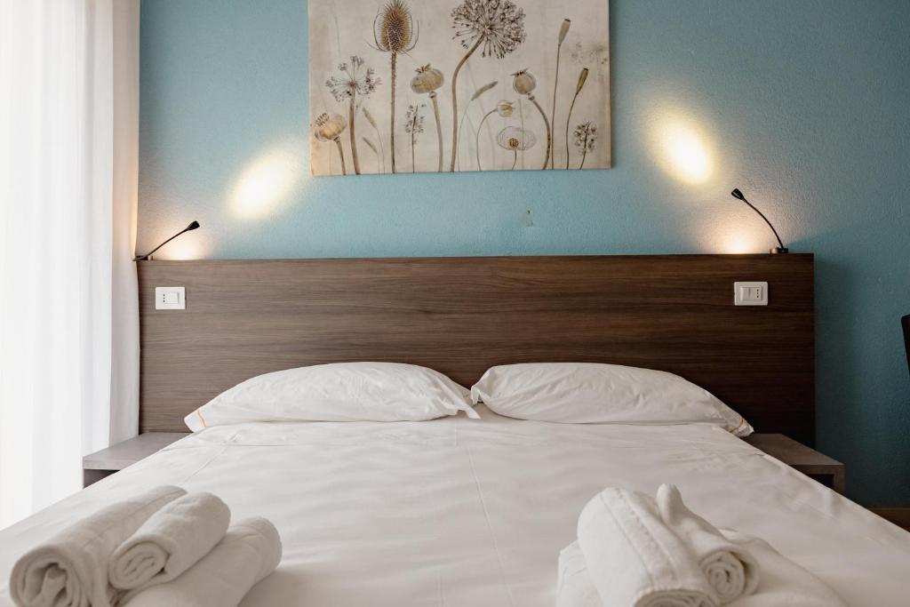 Hotel BluMarineにあるベッド