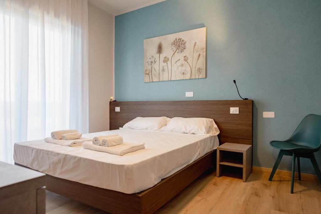 Hotel BluMarineにあるベッド