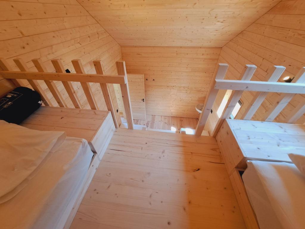 Voodi või voodid majutusasutuse Hytte - Relais randonneur - capacité MAX de 9 personnes toas