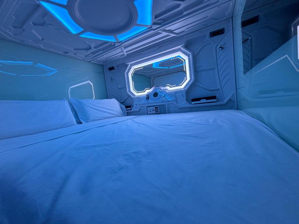 Postel nebo postele na pokoji v ubytování Futurotel Sevilla