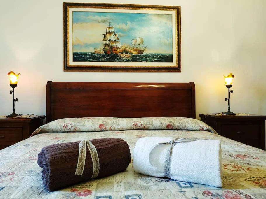 Postel nebo postele na pokoji v ubytování Appartamento Sulcis Sardegna