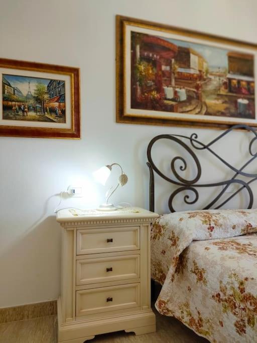 Postel nebo postele na pokoji v ubytování Appartamento Sulcis Sardegna