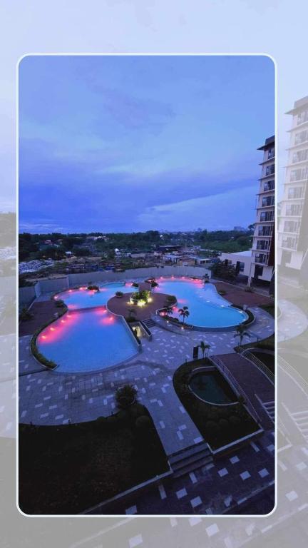 Bazén v ubytování JeeCee Homes in Mactan Lapu-Lapu Cebu nebo v jeho okolí