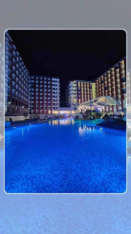 Bazén v ubytování JeeCee Homes in Mactan Lapu-Lapu Cebu nebo v jeho okolí